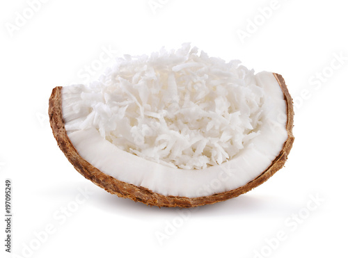 Coconut with coconut flakes isolated on white background.