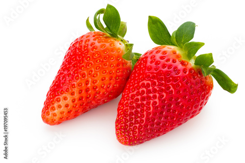 Fresh strawberries close up on white background.