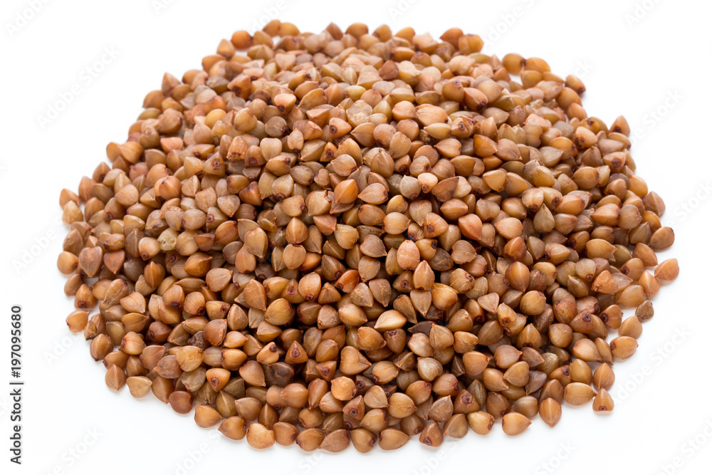 Buckwheat grains isolated on the white background. Buckwheat grains isolated on the white background.