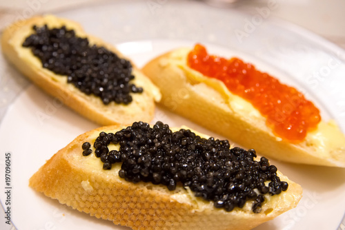 Sandwiches with red and black caviar