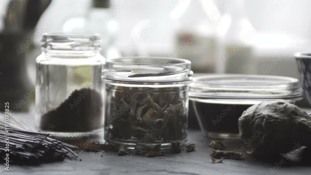Red rice vinegar, rice and rice noodles on the table. Asian cuisine. Video desaturate Red rice vinegar, rice and rice noodles on the table. Asian cuisine. Video desaturate