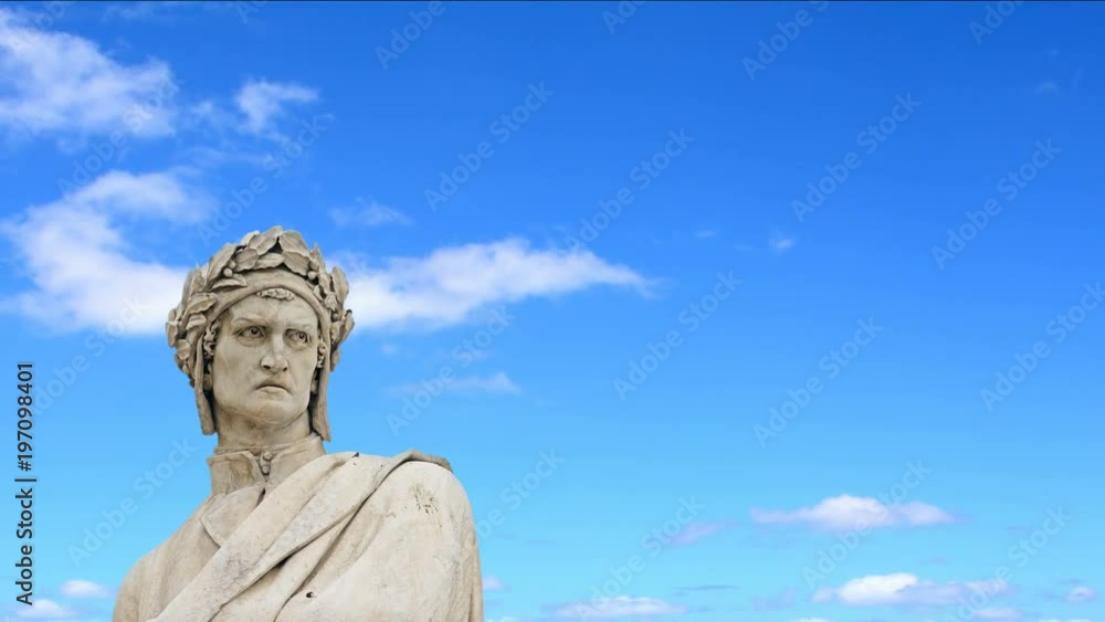 Clouds passing over Dante Alighieri statue in Florence. Tuscany, Italy. Time lapse effect Clouds passing over Dante Alighieri statue in Florence. Tuscany, Italy. Time lapse effect