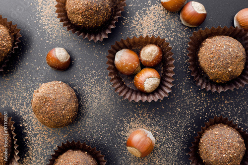 chocolate petit four sweets with hazelnuts photo