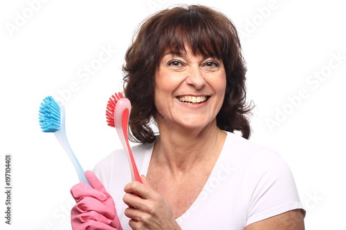 Mature woman cleaning