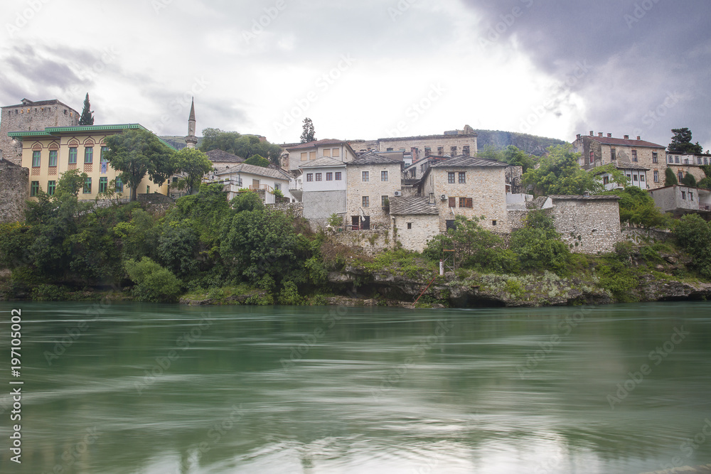 View of Old Town Mostar from the bank of Neretva River, Bosnia and Herzegovina.