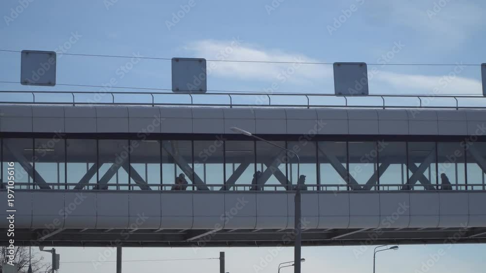 silhouettes of people strolling inside the transparent transition silhouettes of people strolling inside the transparent transition