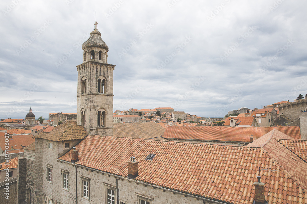 Saint Dominic Church bell tower and red roofs of the  Dominican Monastery in old town Dubrovnik, Croatia