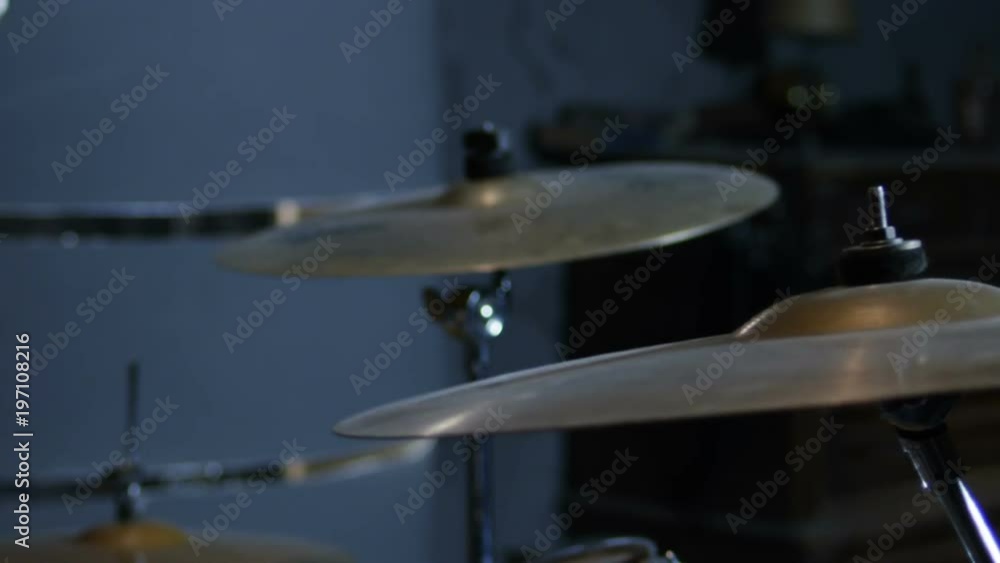 Hitting on drum cymbal with drumstick. Drumstick breaking from heavy