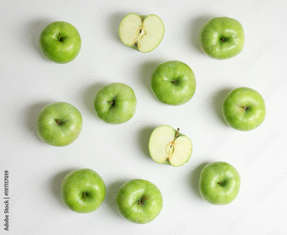 Fresh green apples on white background, flat lay Fresh green apples on white background, flat lay