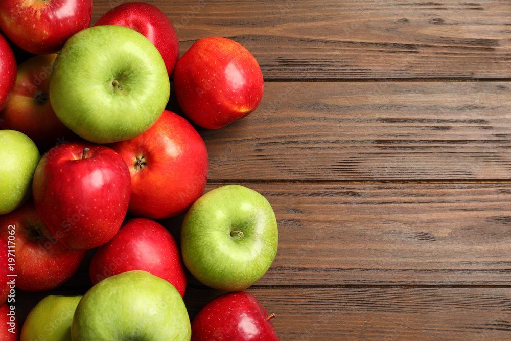 Fresh ripe red apples on wooden background Fresh ripe red apples on wooden background