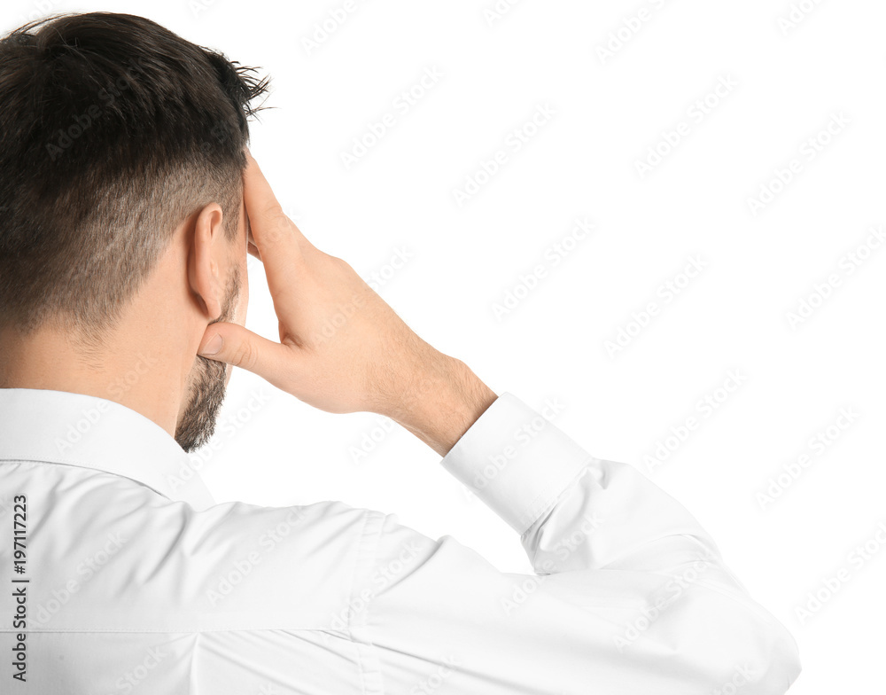 Young man suffering from headache on white background Young man suffering from headache on white background