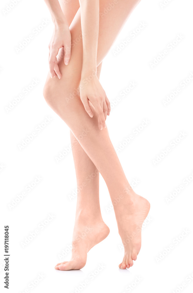 Young woman with silky skin on white background, closeup of legs Young woman with silky skin on white background, closeup of legs