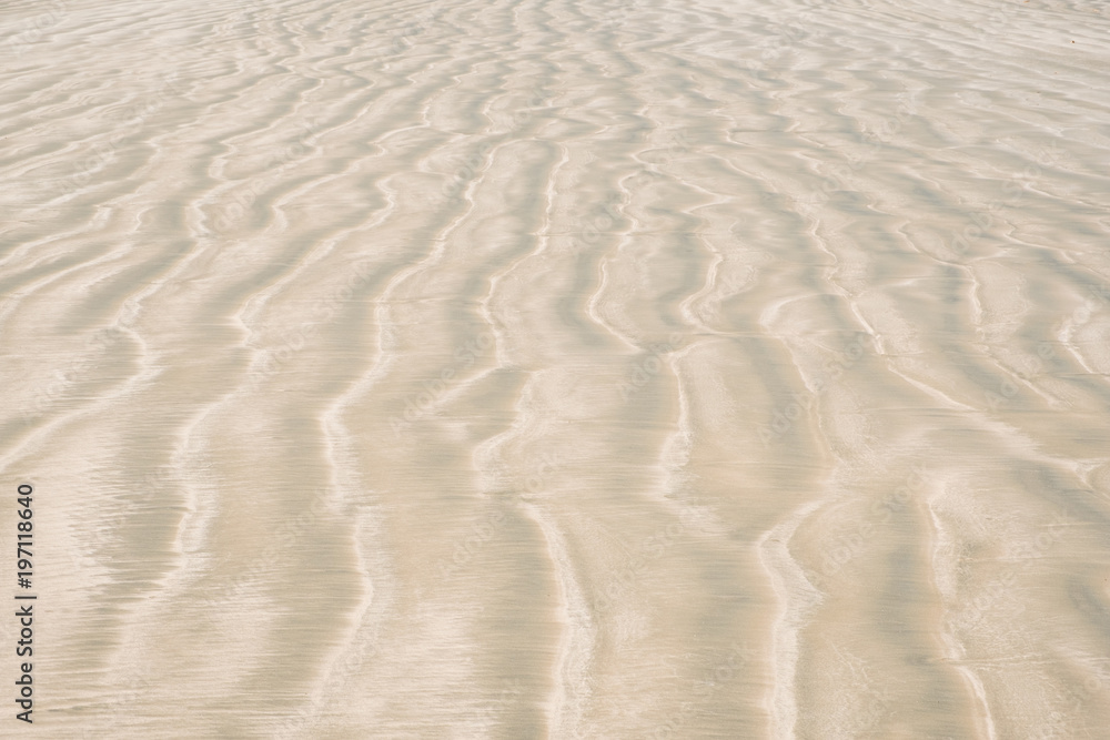 beach background, san pattern - sand texture on white sand beach beach background, san pattern - sand texture on white sand beach