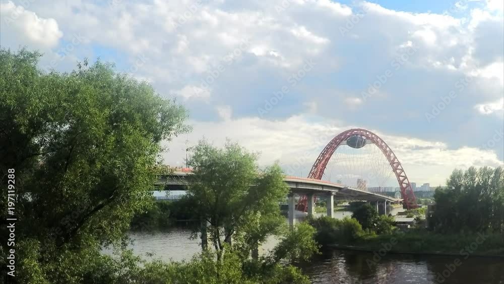 modern bridge across the river and green trees timelapse modern bridge across the river and green trees timelapse