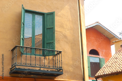 Wallpaper Mural Open green wood window on old wall with balcony Torontodigital.ca