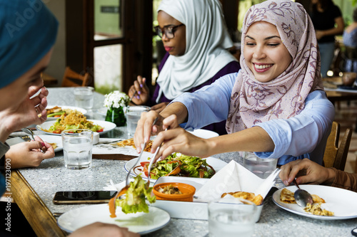 Photography Islamic women friends dining together with happiness