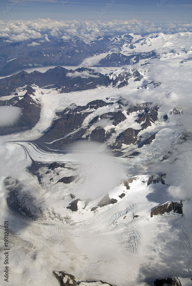 Aerial view of snow capped mountains and glaciers between Fairbanks and Anchorage, Alaska. Aerial view of snow capped mountains and glaciers between Fairbanks and Anchorage, Alaska.