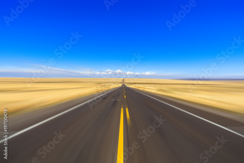 Desert two lane highway with motion blur