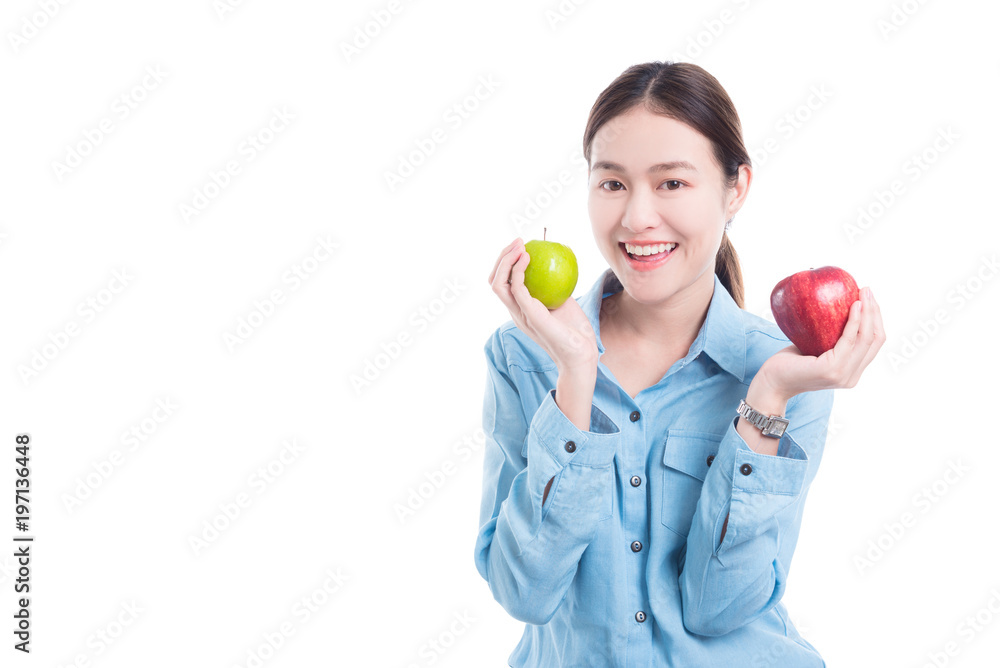 Beautiful asian young woman holding apples and smiles over white background Beautiful asian young woman holding apples and smiles over white background