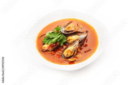 Mussel soup on white background