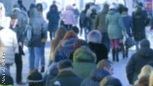 Wallpaper Mural Unrecognizable crowd of people in warm winter clothes walking along icy street of winter city in frosty weather. Slow motion. Torontodigital.ca