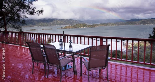 Rainbow Landscape seen from a Large Deck with Panoramic Views. photo