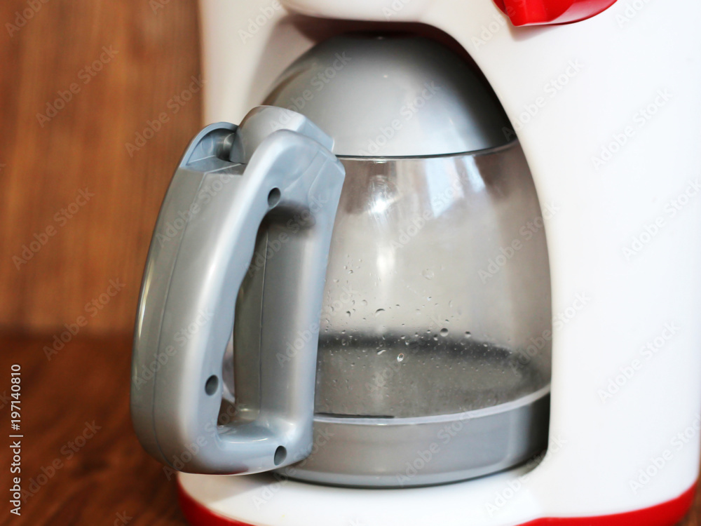 Children's toy - electric kettle. Plastic toy teapot. Children's toy - electric kettle. Plastic toy teapot.