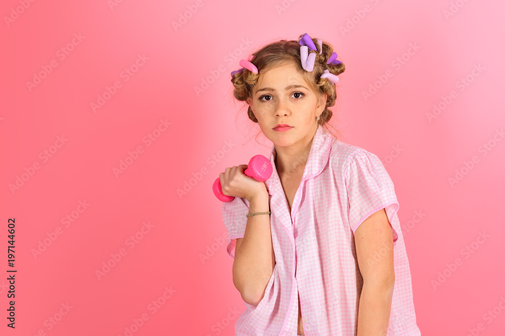 Strong Child - Little Girl Raises Dumbbell Strong Child - Little Girl Raises Dumbbell
