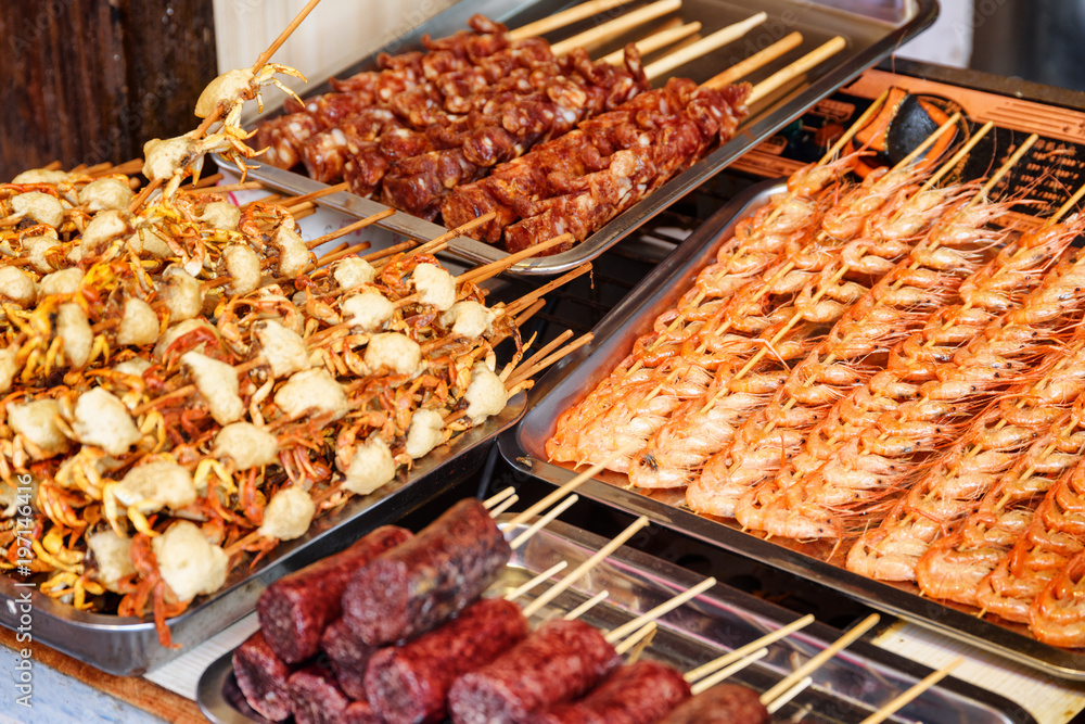Grilled small crabs and prawns. Asian street food Grilled small crabs and prawns. Asian street food