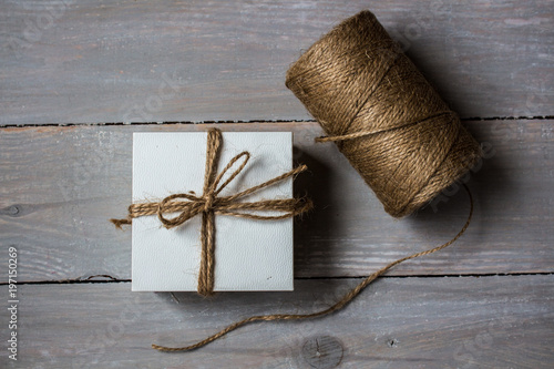 a gift box tied with a rope
