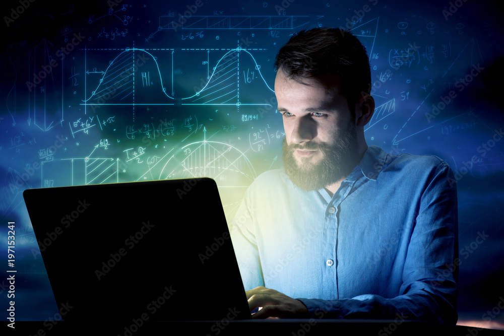 Businessman in the office at night Businessman in the office at night