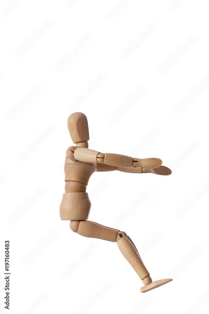 Wood Mannequin Driving a Car concept on isolate white background with space for text Wood Mannequin Driving a Car concept on isolate white background with space for text