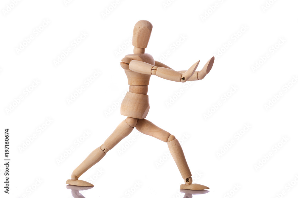 Wooden mannequin isolated on white background Wooden mannequin isolated on white background