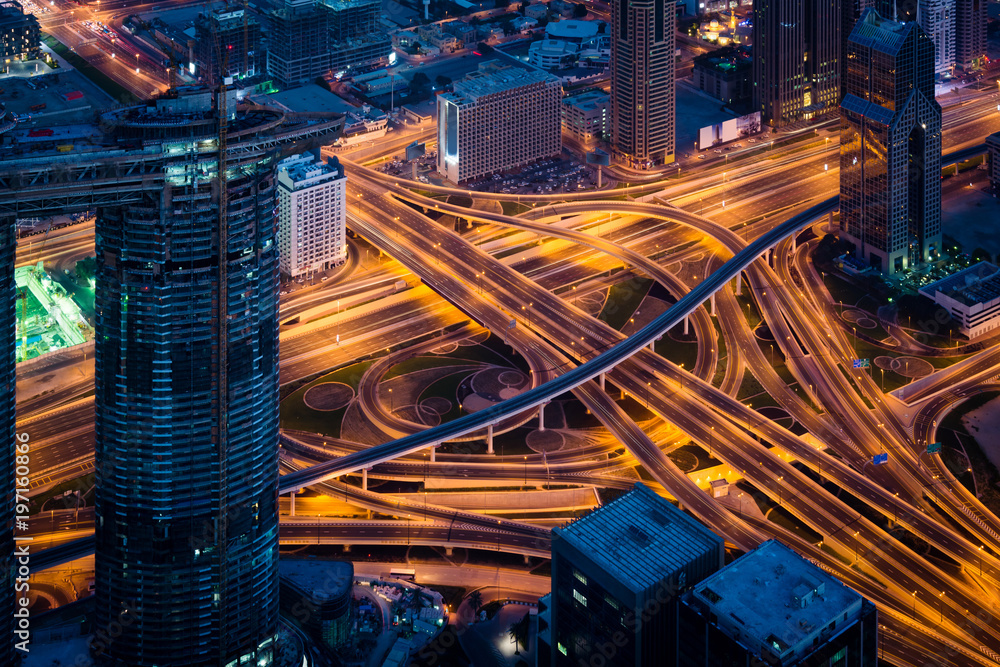 Fototapeta premium Complex highway interchange on Dubai highway at night