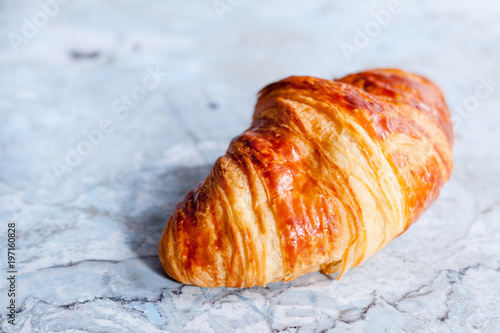 croissant on marble background photo