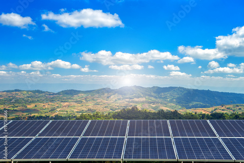 solar panel on Forested Mountain blue sky background.