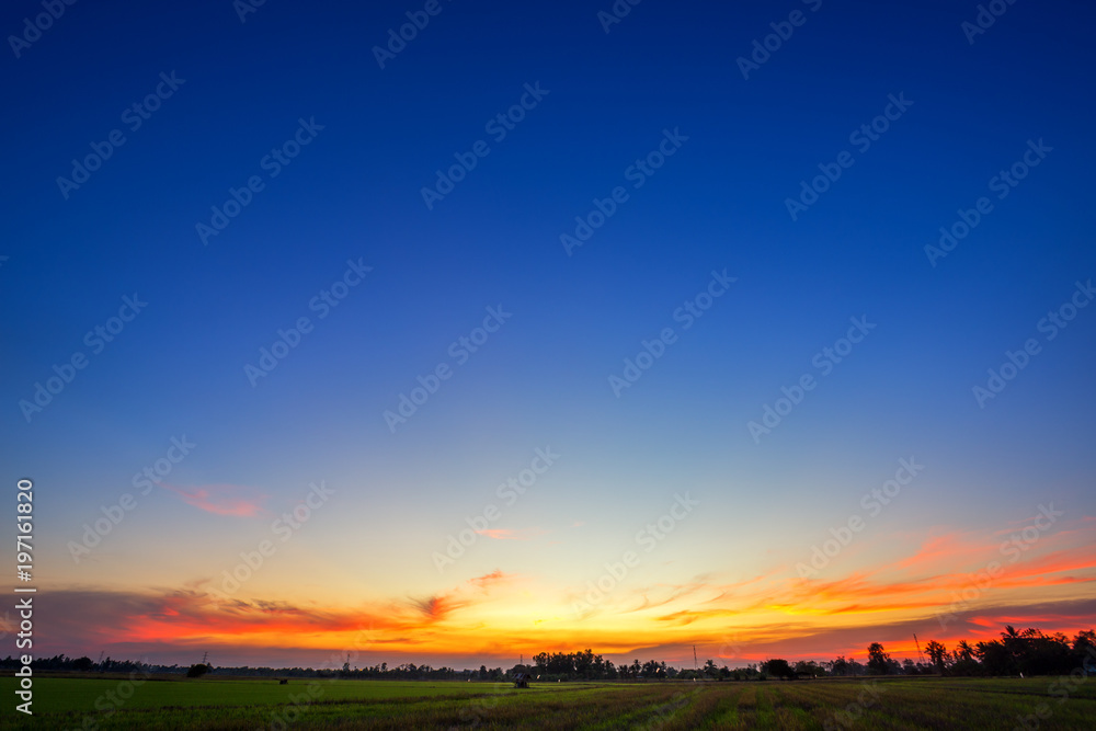 Beautiful fluffy clouds with evening sunset background.