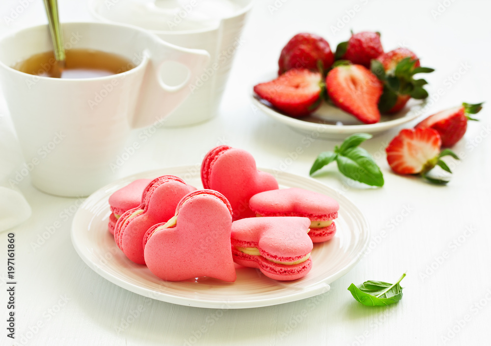 French pastry makaron. Heart shape. Valentine's Day. Selective focus French pastry makaron. Heart shape. Valentine's Day. Selective focus