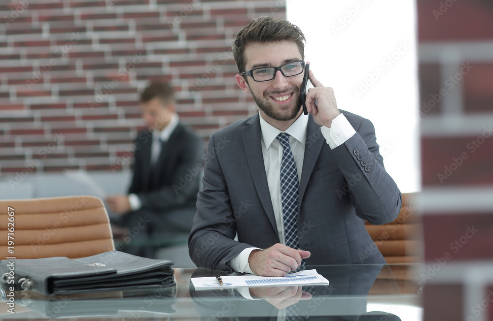financial Manager sitting at his working place financial Manager sitting at his working place
