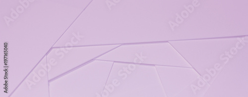 Abstract geometric background in light pastel tones from sheets of thick pale pink paper, cardboard.