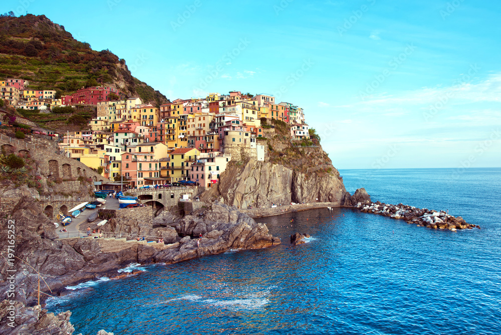  Beautiful colorful summer landscape on the coast of Manarola in Cinque Terre, Liguria, Italy, Europe in the morning