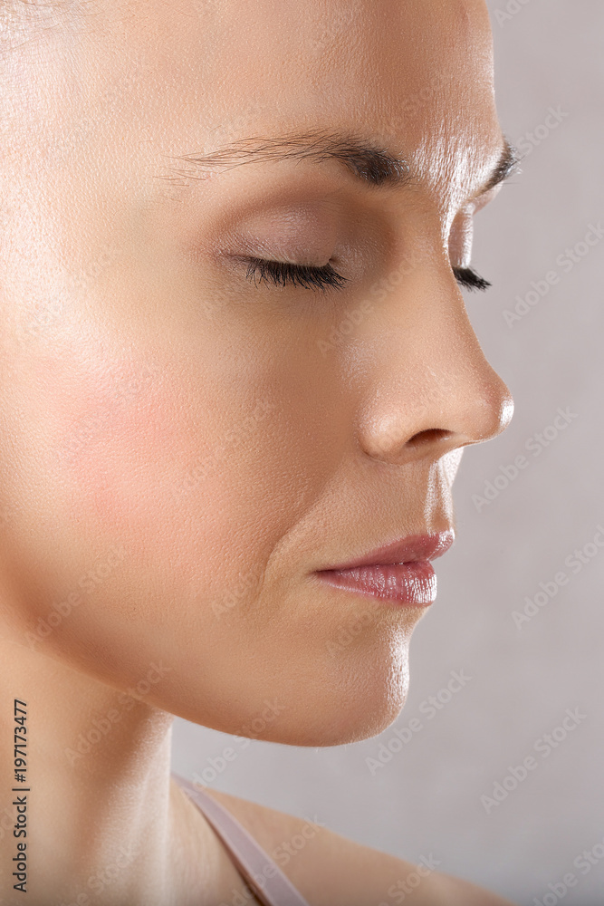 Obraz premium Face of a young caucasian lady. Closeup