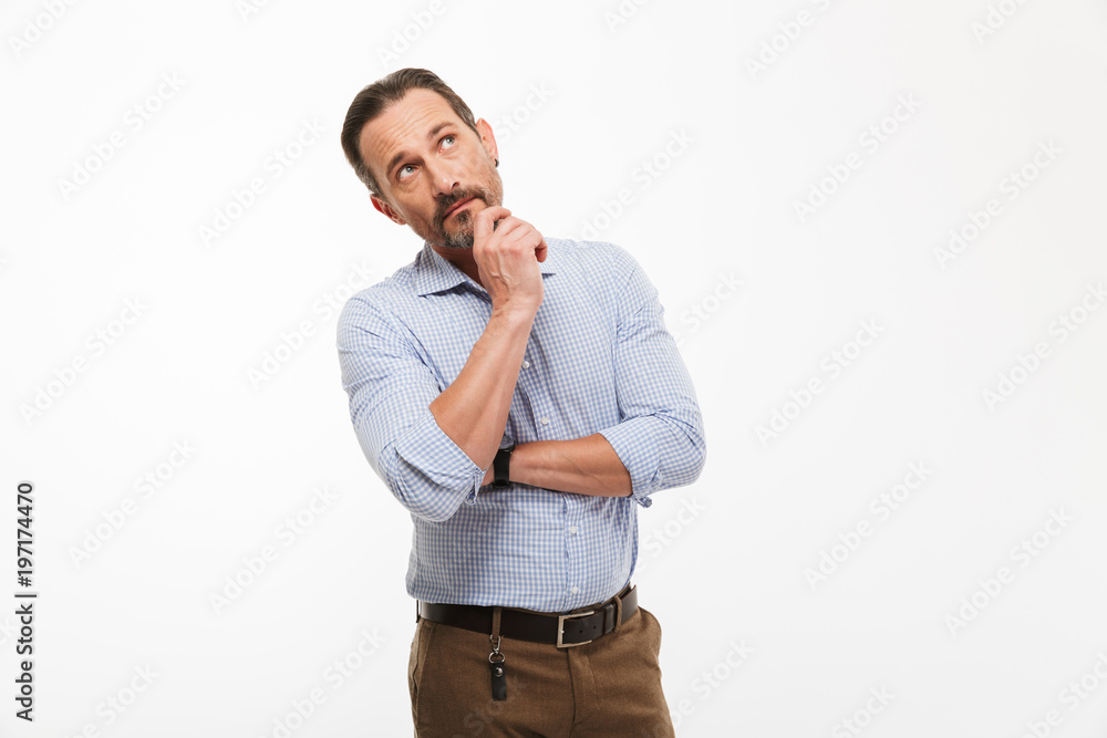 Thoughtful handsome mature businessman