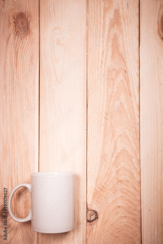 Cup on wood with space for text Cup on wood with space for text