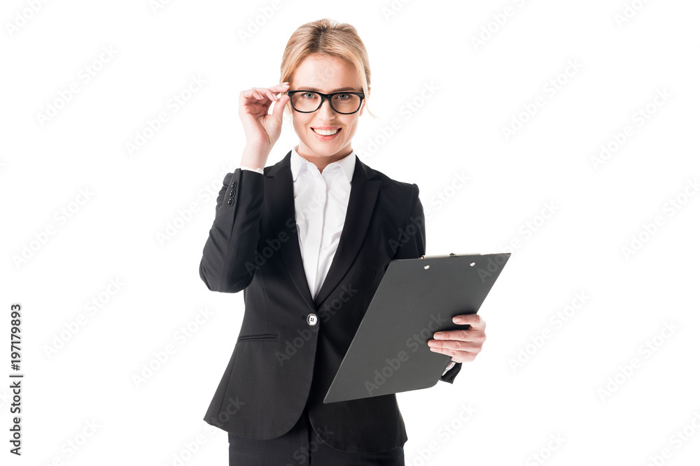 Smiling businesswoman holding clipboard isolated on white Smiling businesswoman holding clipboard isolated on white