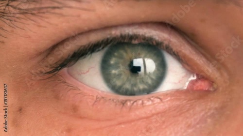Closeup of man's eye moving looking around