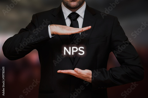Billede på lærred Net Promoter score (NPS) concept text between hands of the businessman, blurry b