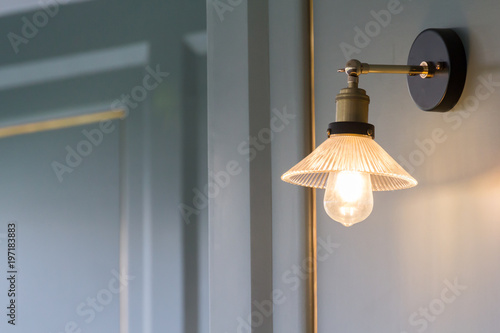 luxury lamp wall decoration in bedroom, gold lamp hanging on wooden wall
