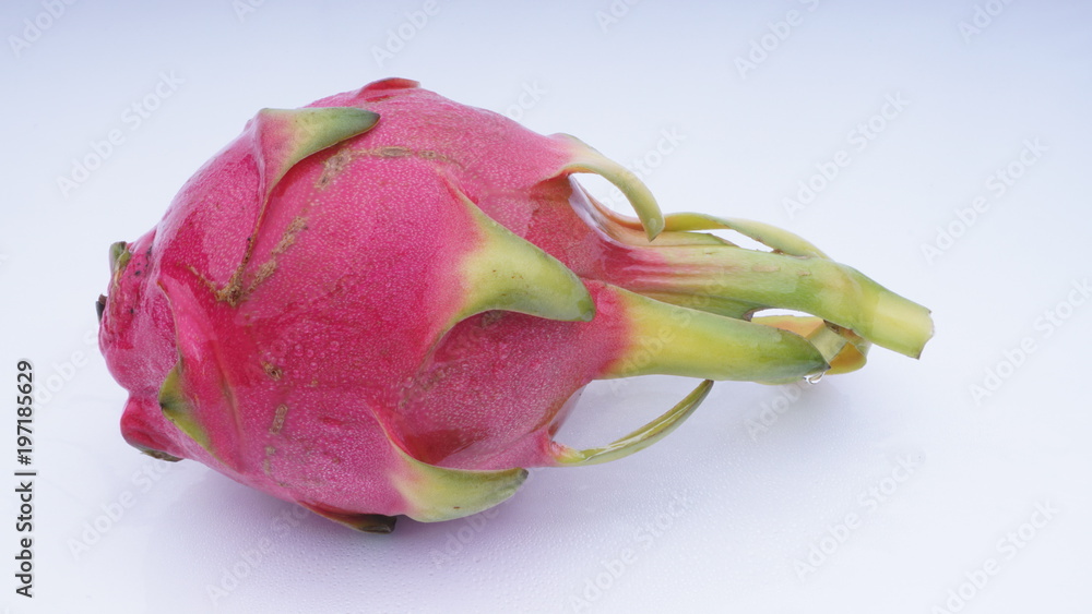 Closeup of dragon fruit on white background.Selective focus and crop fragment. Closeup of dragon fruit on white background.Selective focus and crop fragment.