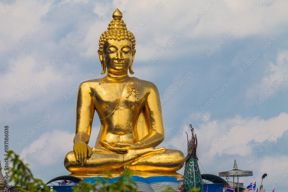 sitting golden big Buddha statue at Golden Triangle at view point of Kong river in Chiang Rai Thailand sitting golden big Buddha statue at Golden Triangle at view point of Kong river in Chiang Rai Thailand